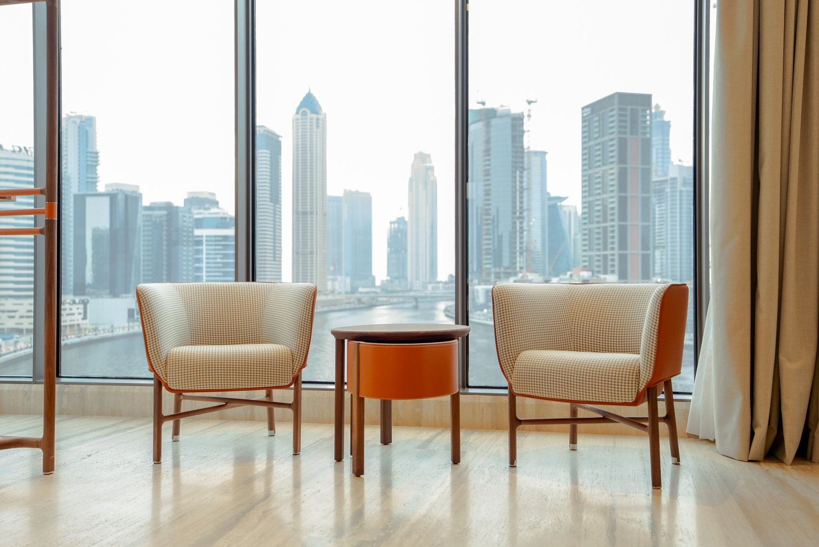 Luxury apartment interior design Dubai 2026 — modern living room with warm finishes