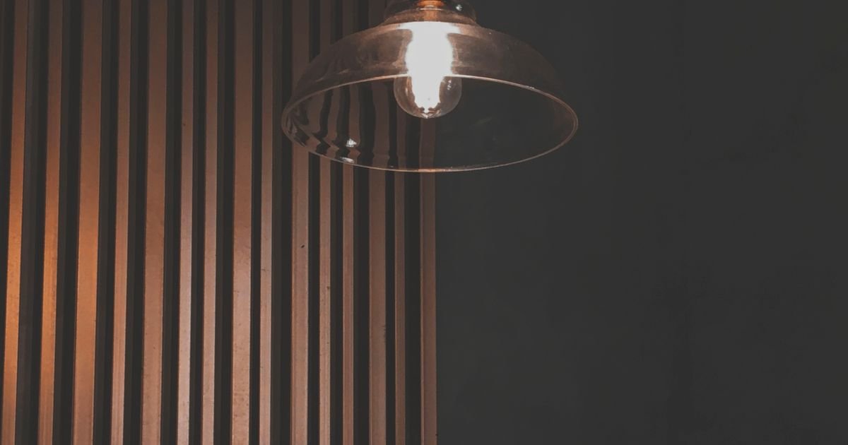 Modern interior lighting design with layered LED ambient and pendant fixtures in a contemporary Dubai home 2026