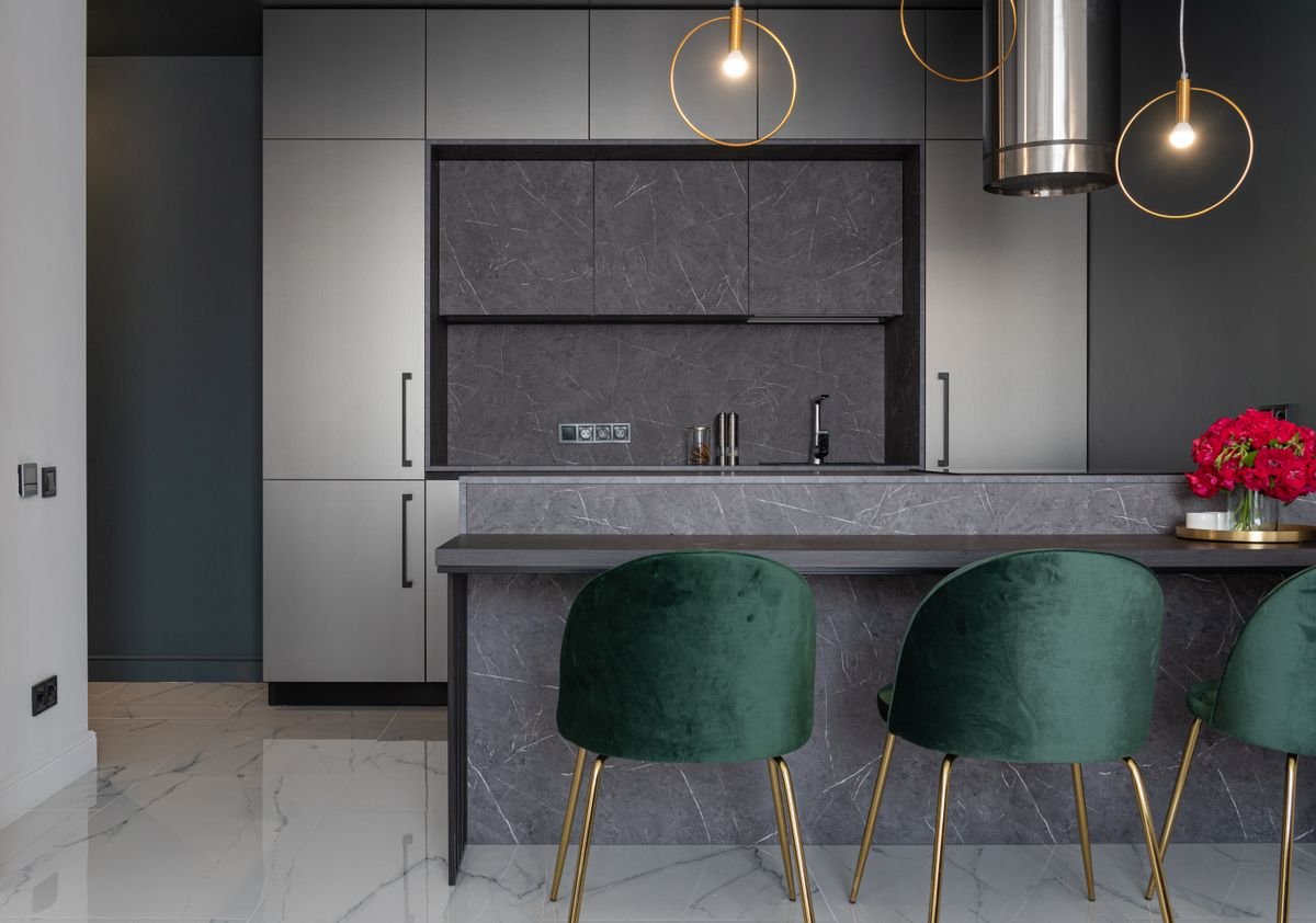 Modern luxury kitchen interior design Dubai 2026 — handleless cabinetry and stone countertop