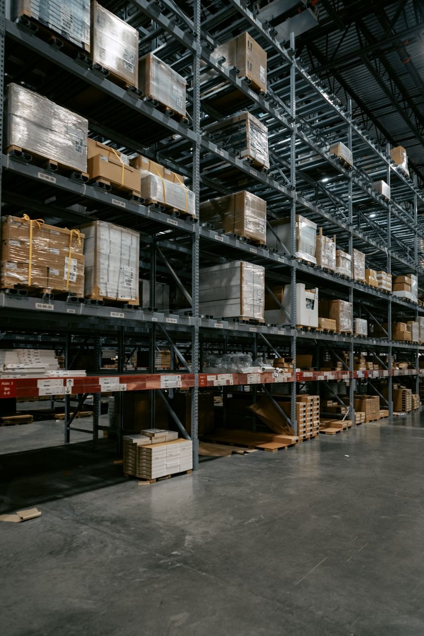 Well-organised industrial warehouse interior with racking and pallets, UAE 2026